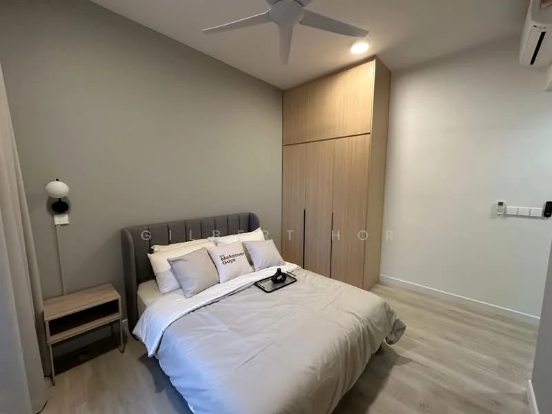 Bedroom features: queen-size bed with white bedding, upholstered grey headboard, wooden bedside table, wall-mounted reading lamp, built-in wardrobe with wooden doors, light grey painted walls, light wood flooring, ceiling fan, air conditioning unit; style: modern.