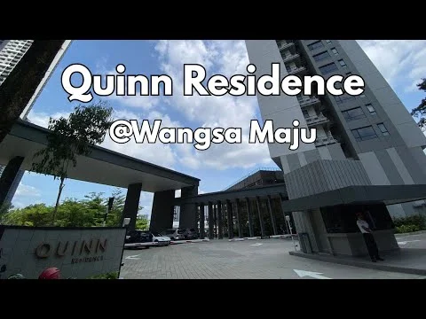 Exterior type: high-rise condominium; features: glass curtain wall, grey painted facade, covered parking area, landscaped entrance, manicured greenery, signage with building name, multiple storeys, modern architectural design; style: modern.