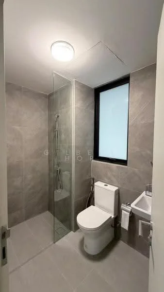 Bathroom features: grey tiled walls, grey tiled flooring, walk-in shower with glass enclosure, rain shower head, handheld shower, one-piece toilet, chrome basin mixer, framed mirror, towel rack, window for natural light, recessed ceiling light; style: modern.