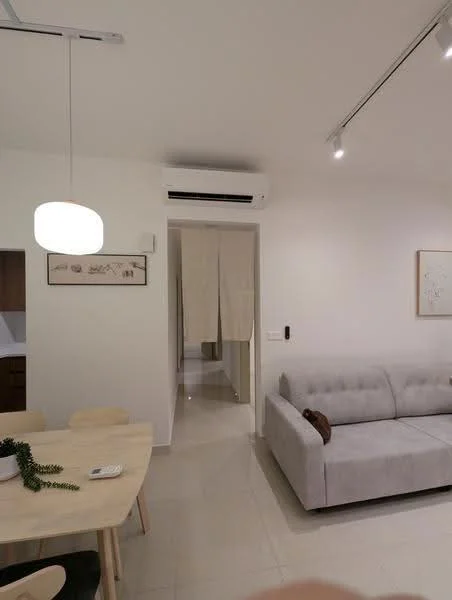 Living features: light grey fabric sofa, dining table with wooden legs, 4 wooden dining chairs, white pendant light, recessed LED downlights, wall-mounted split AC, cream painted walls, glossy tile flooring, decorative wall art, open layout to kitchen, neutral color palette; style: modern. Room features: white painted walls, glossy tile flooring, doorway leading to hallway.