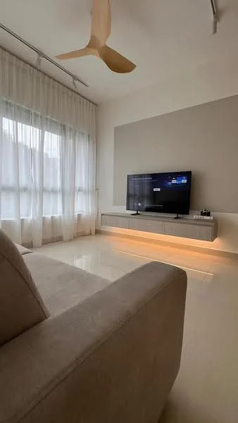 Living features: 5-blade ceiling fan with light, floor-to-ceiling windows, sheer curtains, light-coloured walls, accent wall in beige, polished tile flooring, wall-mounted TV, TV console with LED strip lighting, sofa in light fabric, decorative wall panel; style: modern.