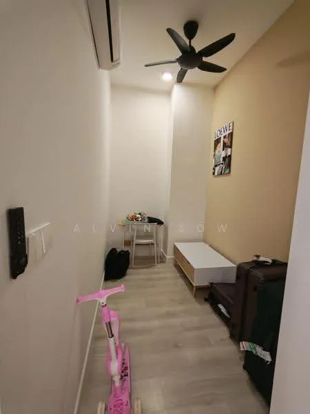 Room features: light wood flooring, white painted walls, accent wall in beige, 5-blade ceiling fan, recessed downlights, small table, chair, scooter, suitcase, storage bench; style: modern.