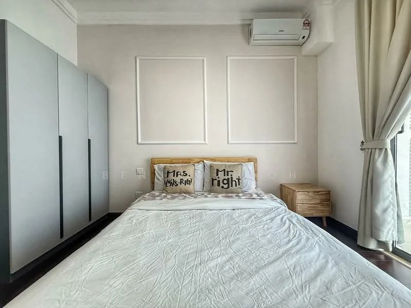 Bedroom features: king-size bed with white bedding, two decorative pillows with text, wooden bedside table, wall-mounted air conditioning unit, built-in wardrobe with grey doors, white painted walls, dark wood flooring, curtains, framed wall panels; style: modern.