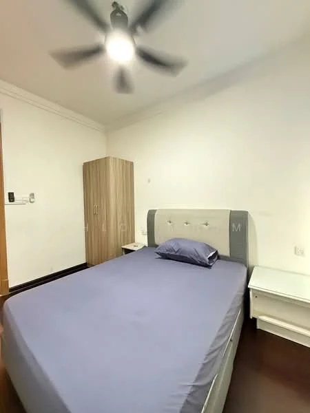 Bedroom features: queen-size bed with grey upholstered headboard, light blue bedspread, 2 white bedside tables, ceiling fan with light, wooden wardrobe, dark wood flooring, white painted walls, crown moulding; style: modern.