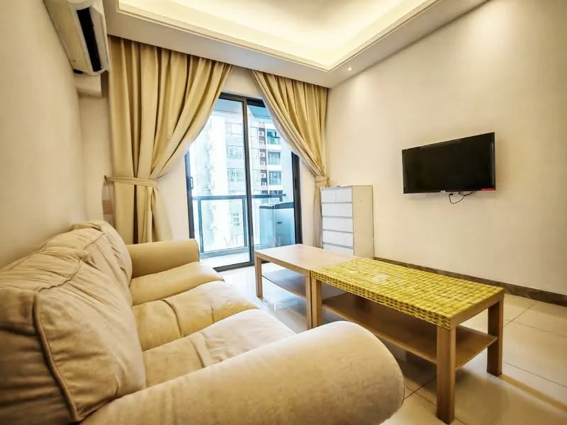 Living features: beige fabric sofa, wood coffee table with green mosaic top, wall-mounted TV, floor-to-ceiling windows, sheer curtains, white walls, recessed ceiling lights, 1 wall-mounted split AC, tile flooring, built-in storage cabinet; style: modern; view: city.