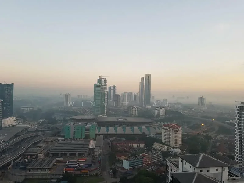 Exterior type: high-rise condominium; features: city skyline view, multiple high-rise buildings, urban landscape, commercial buildings, highway visible, surrounding greenery; style: modern.