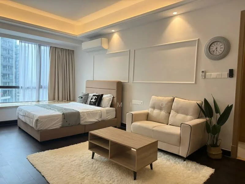Bedroom features: queen-size bed with beige upholstered headboard, white bedding, 2 bedside pillows, light wood bedside table, 3-seater fabric sofa in cream, wooden coffee table with open shelving, floor-to-ceiling windows with sheer curtains, air conditioning unit on wall, recessed ceiling lights, dark wood flooring, decorative wall clock, indoor plant in ceramic pot; style: modern; view: city.