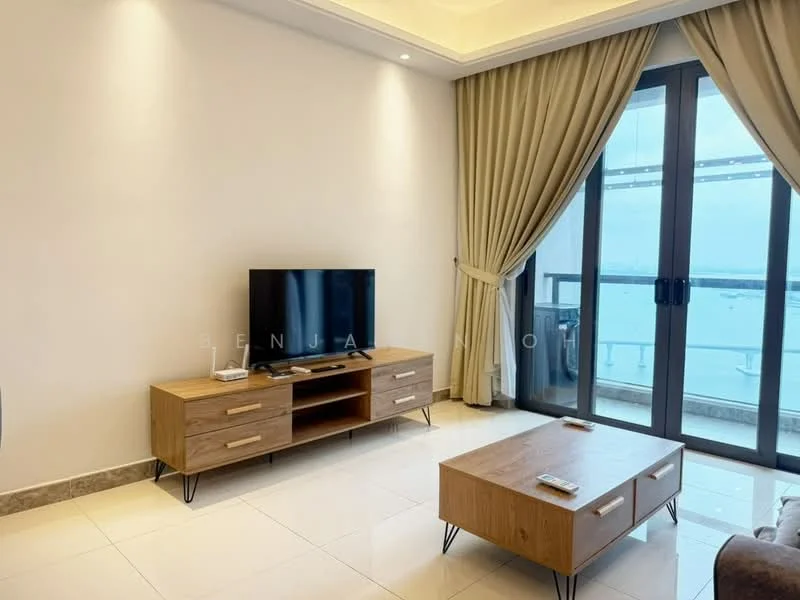 Living features: white painted walls, recessed ceiling lights, floor-to-ceiling windows, curtains, light-colored tiled flooring, wooden TV console, wall-mounted TV, coffee table, remote control on coffee table; style: modern; view: sea.