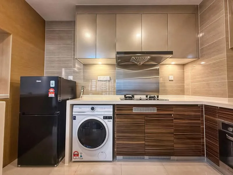 Kitchen features: brown wooden cabinetry, white countertop, stainless-steel range hood, built-in gas hob, stainless-steel oven, black fridge, front-load washing machine, ceramic tile flooring, grey tiled backsplash, recessed downlights; style: modern.
