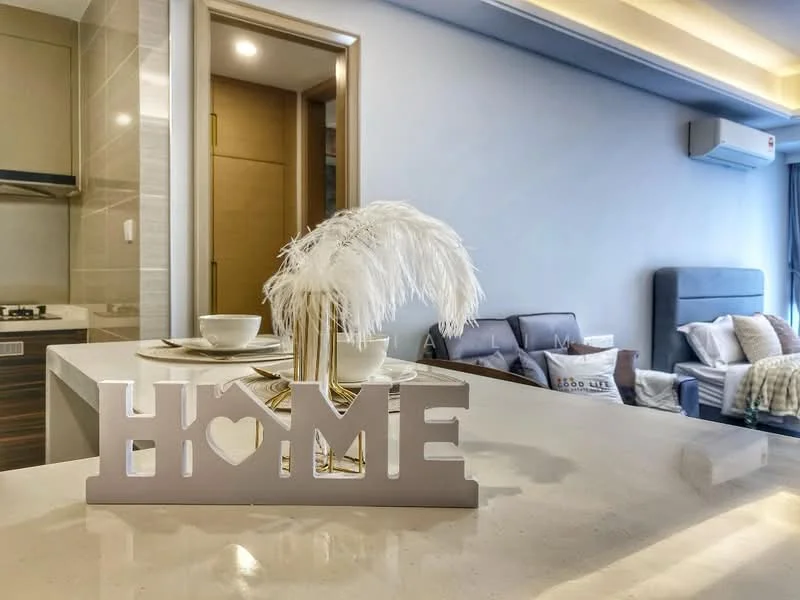 Room features: white countertop, decorative 'HOME' sign, feather decor, dining plates, cutlery, wall-mounted air conditioning unit, grey upholstered sofa, throw pillows, wall with light-colored paint, recessed ceiling lights; style: modern.