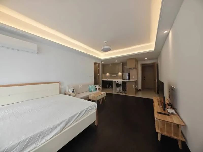 Bedroom features: king-size bed, wooden bed frame, white bedding, 2 wooden side tables, wall-mounted TV, air conditioning unit, recessed ceiling lights, dark wood flooring, open layout to kitchen, neutral painted walls; style: modern. Kitchen features: kitchen island, stainless-steel sink, built-in cabinets, countertop with bar seating, refrigerator, built-in oven, ceramic tile flooring, light-colored cabinetry; style: modern.