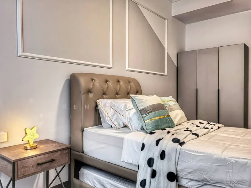 Bedroom features: king-size bed, upholstered headboard in beige, white bedding, decorative throw blanket with polka dots, nightstand with lamp, table lamp with yellow star design, grey wardrobe, white painted walls, geometric wall design, crown moulding; style: modern.