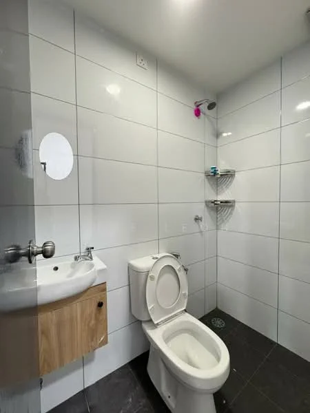 Bathroom features: white tiled walls, black tiled flooring, single-sink vanity with wood cabinet, chrome basin mixer faucet, one-piece toilet, shower with wall-mounted showerhead, shelf for toiletries, mirror above sink; style: modern.