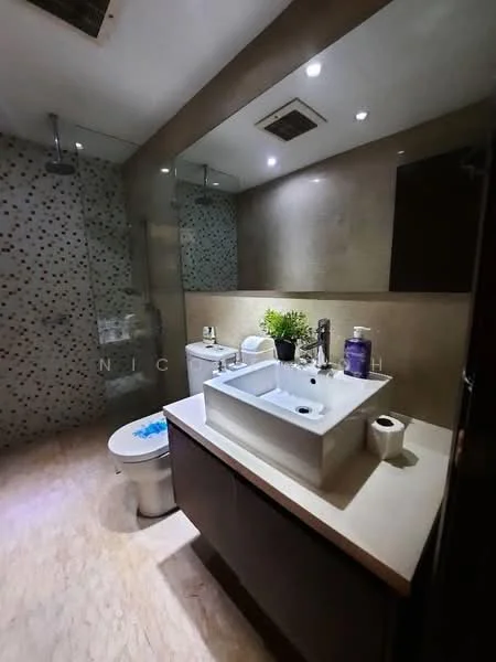 Bathroom features: single-sink vanity with white ceramic basin, chrome basin mixer faucet, mirror above vanity, toilet, walk-in shower with glass enclosure, rain shower head, wall-mounted shower controls, tile cladding with mosaic pattern, cream marble flooring, recessed downlights, decorative plant on vanity; style: modern.