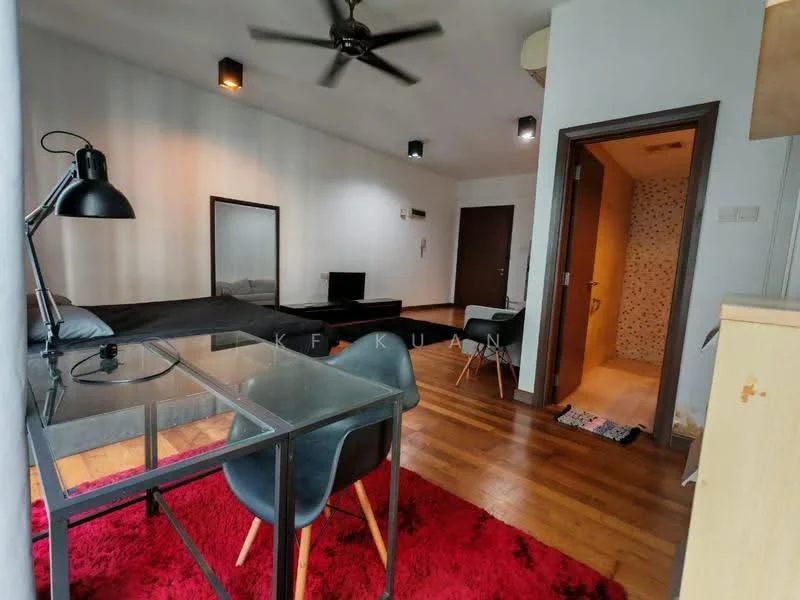 Living features: 3-seater black fabric sofa, glass coffee table, black floor lamp, ceiling fan with light, wooden flooring, red area rug, wall-mounted TV, mirror on wall, decorative wall paneling, open layout to adjacent room; style: modern. Room features: doorway leading to bathroom, light-colored wall tiles, wooden door, light fixture.