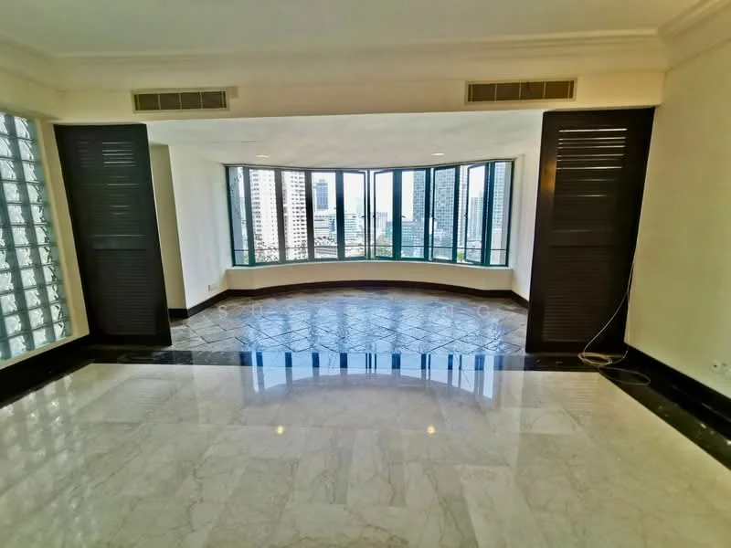 Living features: marble flooring, floor-to-ceiling windows, city skyline view, recessed ceiling, black accent trim, curved wall design, glass block wall, natural light, open layout; style: modern; view: city.