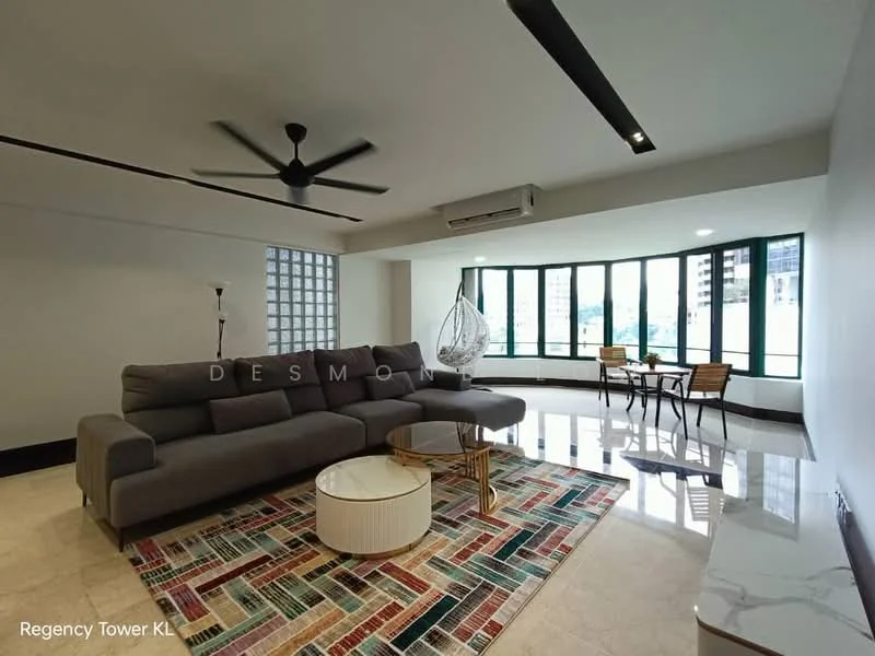 Living features: L-shape sectional sofa in grey, coffee table, area rug with geometric pattern, 5-blade ceiling fan with light, floor-to-ceiling windows, marble flooring, wall-mounted air conditioning unit, decorative floor lamp, dining table with chairs, hanging chair, natural light from windows; style: modern; view: city.