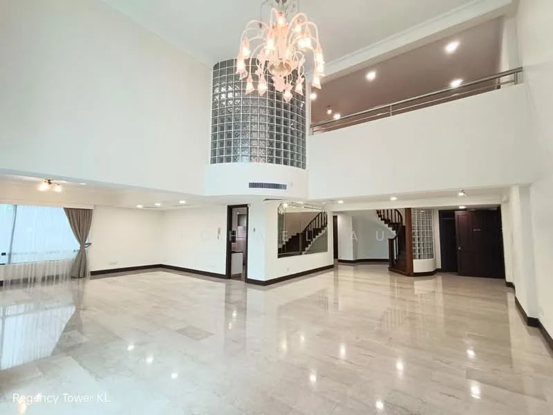 Room features: marble flooring, high ceiling, chandelier, glass block wall, large windows with sheer curtains, staircase with wooden railing, recessed downlights, open layout, neutral wall color, corner space for furniture arrangement; style: modern.