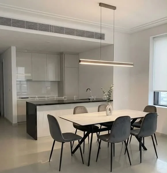 Dining features: rectangular dining table, 6 upholstered dining chairs in grey, pendant light fixture, white walls, polished concrete flooring, large window with sheer blinds, decorative vase on table; style: modern. Kitchen features: white cabinetry, black countertop, built-in oven, stainless-steel sink, chrome pull-down faucet, ceramic tile backsplash, recessed downlights, open shelving; style: modern.