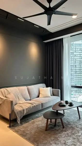 Living features: 3-seater fabric sofa in beige, area rug with geometric pattern, coffee table, 5-blade ceiling fan with light, floor-to-ceiling windows, blackout curtains, grey accent wall, decorative throw blanket, decorative cushions; style: modern; view: city.