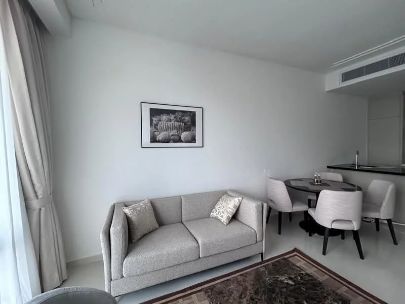 Living features: light grey fabric sofa, decorative cushions, framed black and white artwork on wall, round dining table, 4 upholstered dining chairs, marble flooring, floor-to-ceiling windows with sheer curtains, neutral painted walls, area rug with geometric pattern; style: modern.