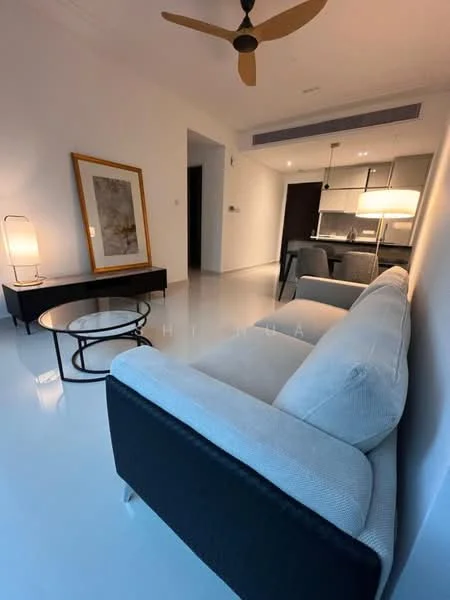 Living features: 3-seater fabric sofa in light grey, black coffee table with circular top, floor lamp with white shade, wall-mounted TV, light-colored walls, polished tile flooring, ceiling fan with light, decorative artwork in frame; style: modern.