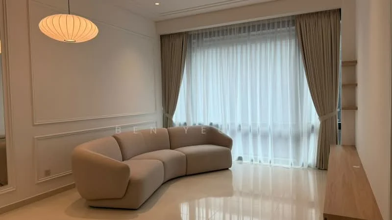 Living features: curved beige fabric sofa, white walls with crown moulding, large floor-to-ceiling window, sheer white curtains, light wood console table, recessed ceiling lights, smooth polished floor, decorative wall paneling; style: modern.