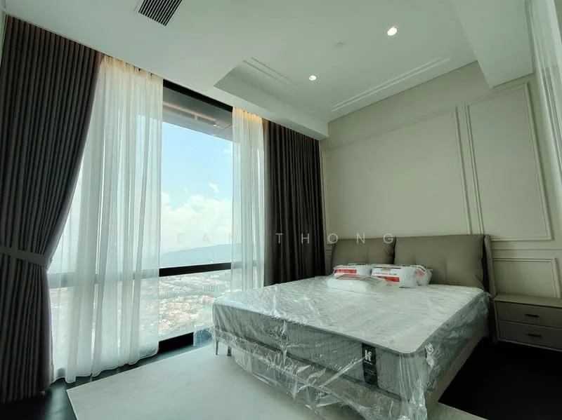Bedroom features: king-size bed, upholstered headboard, floor-to-ceiling windows, sheer curtains, dark grey curtains, wooden bedside table, decorative wall paneling, recessed ceiling lights, carpeted flooring, city view; style: modern; view: city.