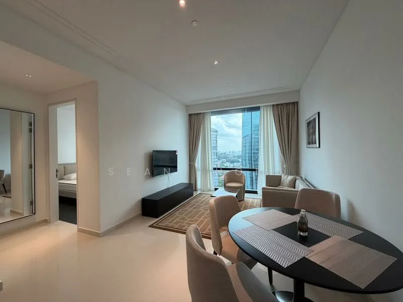 Living features: floor-to-ceiling windows, city view, light-coloured walls, recessed downlights, wall-mounted TV, area rug with geometric pattern, 2-seater fabric sofa, round dining table, upholstered dining chairs, decorative artwork, curtains, neutral-coloured flooring; style: modern. Room features: light-coloured walls, neutral flooring.