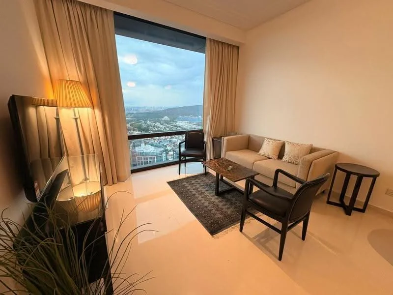 Living features: beige fabric sofa, black armchair, glass coffee table, area rug with geometric pattern, floor-to-ceiling windows, curtains, TV console, wall-mounted TV, decorative lamp, indoor plant; style: modern; view: city.