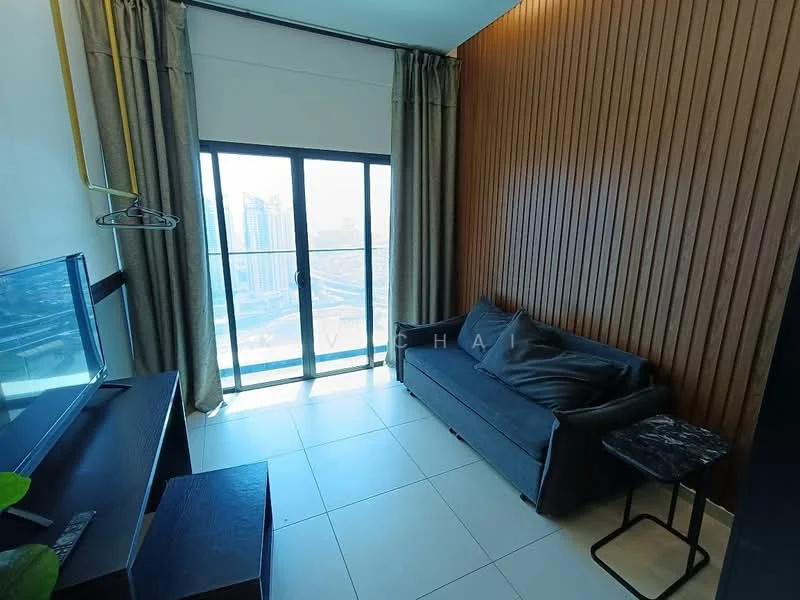 Living features: floor-to-ceiling windows, black fabric sofa, small side table with marble top, wood panel accent wall, light grey curtains, TV console, tile flooring, city view; style: modern; view: city.