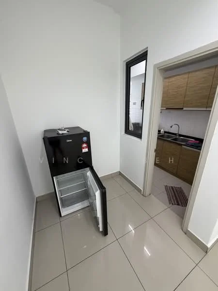 Room features: black fridge, white painted walls, glossy tile flooring, window with black frame, kitchen visible through doorway, brown cabinetry in kitchen, kitchen countertop, kitchen sink visible.