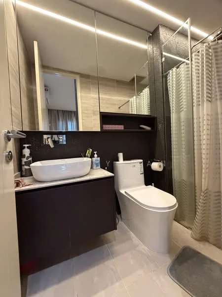 Bathroom features: single-sink vanity with dark wood cabinet, white ceramic basin, chrome basin mixer faucet, one-piece toilet, glass shower enclosure, rain shower head, shower curtain, wall-mounted mirror, recessed LED downlights, light-colored tile flooring, cream painted walls, towel rack; style: modern.