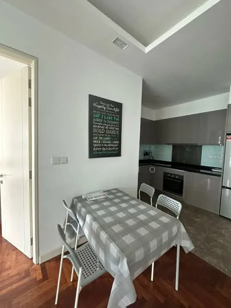 Dining features: grey and white checkered tablecloth, 4 white plastic dining chairs, wooden dining table, framed wall art with text, light grey cabinetry, black countertop, stainless-steel fridge, glass backsplash, open layout, wooden flooring, recessed lighting; style: modern. Kitchen features: black countertop, light grey cabinetry, stainless-steel fridge, glass backsplash; style: modern.