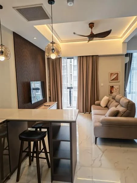 Living features: sofa in beige, 3-seater sofa, coffee table, wall-mounted TV, TV console, recessed downlights, 5-blade ceiling fan, marble tile flooring, floor-to-ceiling windows, sheer curtains, wood accent wall, decorative artwork; style: modern. Kitchen features: kitchen island with seating, bar stools, open shelving, under-cabinet lighting; style: modern.