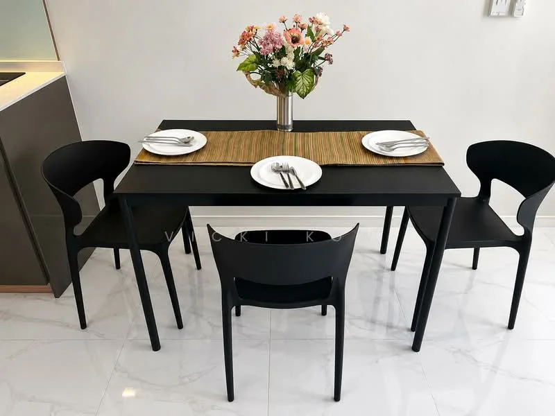 Dining features: black dining table, 4 dining chairs in black, white plates, silver cutlery, decorative flower vase, table runner, marble tile flooring, wall-mounted light fixture; style: modern.