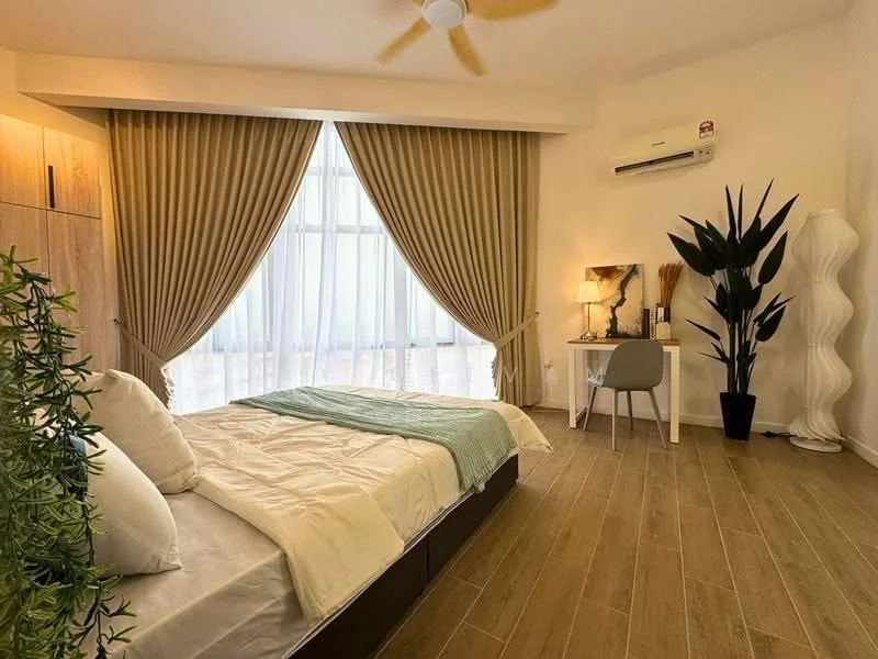 Bedroom features: queen-size bed with white bedding, wooden bed frame, floor-to-ceiling windows, sheer curtains, drapes in beige, wooden flooring, wall-mounted air conditioning unit, study desk with chair, decorative plant, table lamp, decorative vase, tall white decorative lamp, green throw blanket; style: modern; view: city.