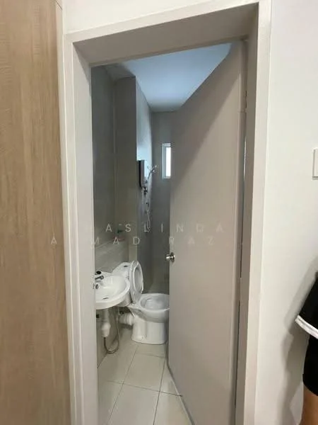 Bathroom features: white tiled walls, light grey tiled flooring, one-piece toilet, sink with chrome faucet, shower with handheld showerhead, small window for natural light, mirror above sink, door leading to bathroom; style: modern.