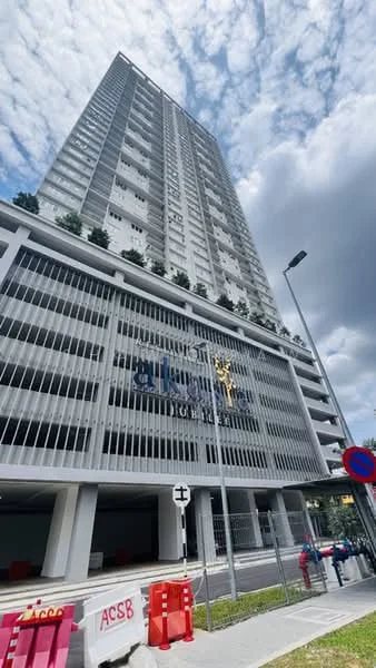 Exterior type: high-rise condominium; features: glass curtain wall, white painted facade, recessed balconies, feature lighting at night, approximately 20-storey high-rise, manicured lawn, surrounded by mature greenery, double-volume main lobby, guard house at entrance, CCTV cameras visible, perimeter fence, gated entry; style: modern.
