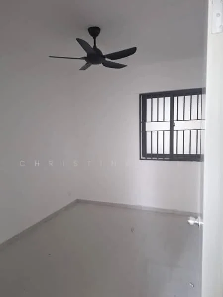 Room features: white painted walls, grey floor tiles, 5-blade ceiling fan, window with security bars, no visible furniture, neutral color scheme, minimalist design, natural light from window; style: minimalist.