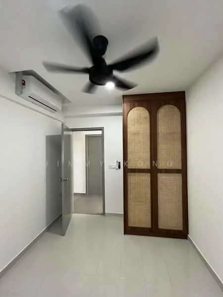Room features: white painted walls, grey tiled flooring, 5-blade ceiling fan with light, wall-mounted split AC, wooden wardrobe with rattan panels, door leading to hallway, door leading to another room, recessed lighting; style: modern.