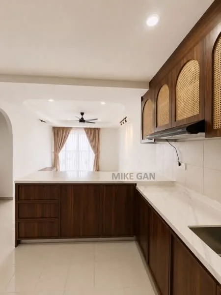 Kitchen features: brown wooden cabinetry, white marble countertop, stainless-steel sink, chrome pull-down faucet, built-in range hood, recessed downlights, 5-blade ceiling fan, tile backsplash, cream tiled flooring, window with sheer curtains, open layout, cane paneling on upper cabinets; style: modern.