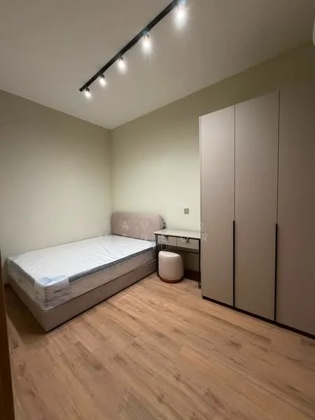 Bedroom features: single bed frame with mattress, built-in wardrobe with sliding doors, wooden flooring, neutral wall color, desk with chair, recessed ceiling lights; style: modern.