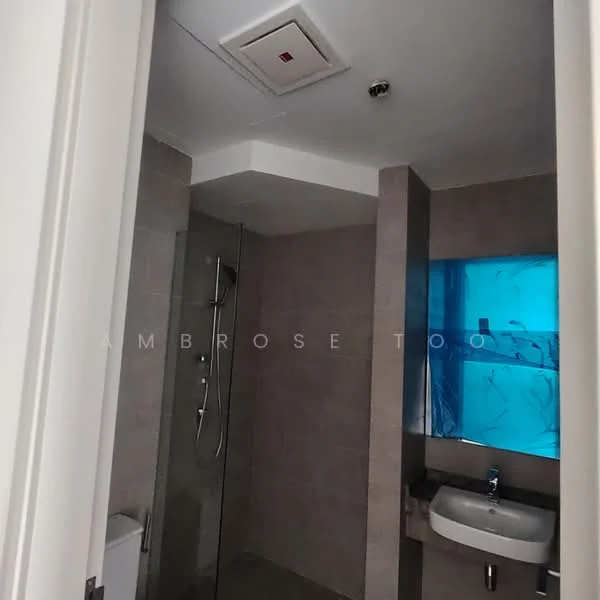 Bathroom features: walk-in shower with glass enclosure, chrome handheld shower, wall-mounted showerhead, single-sink vanity with wall-mounted faucet, white ceramic sink, grey tiled walls, grey tiled flooring, backlit mirror, ventilation fan, blue accent window; style: modern.