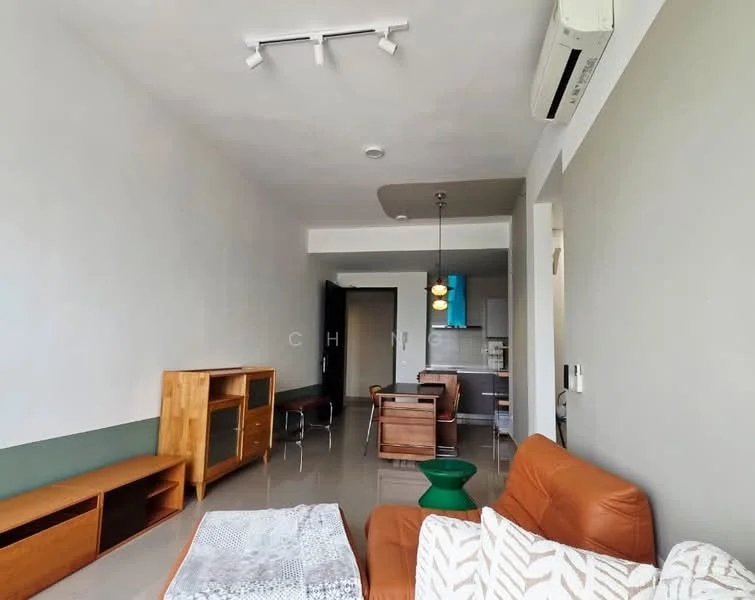 Living features: brown leather sofa, white area rug, wooden TV console, green accent wall, recessed ceiling lights, ceiling-mounted air conditioning unit, pendant light fixture, dining table with chairs visible in background, glossy tile flooring; style: modern.
