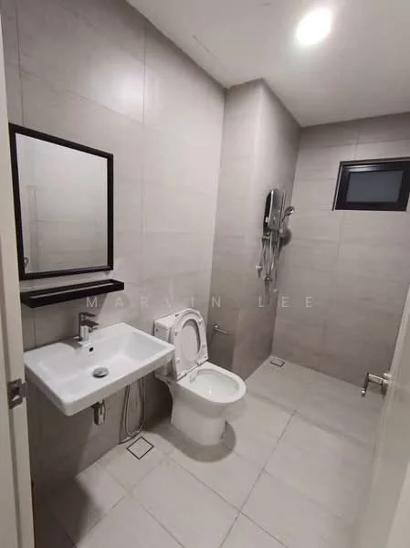 Bathroom features: grey tiled walls, light grey tiled flooring, single-sink vanity with wall-mounted faucet, framed mirror, one-piece toilet, shower with handheld shower head, wall-mounted shower unit, small window, recessed ceiling lights; style: modern.