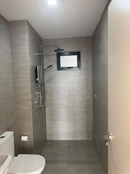 Bathroom features: grey tile cladding on walls, grey tile flooring, one-piece toilet, chrome basin mixer faucet, walk-in shower with glass partition, rain shower head, handheld shower, wall-mounted shower control, small window for ventilation, recessed ceiling lights; style: modern.