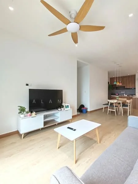 Living features: 5-blade ceiling fan with integrated LED light, wall-mounted TV, white TV console, light wood flooring, grey fabric sofa, coffee table with wooden legs, decorative plants on console, open layout to kitchen, recessed downlights, dining area visible in background; style: modern.
