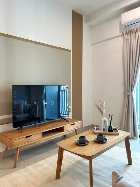 Living features: light beige painted walls, accent wall in light brown, wooden TV console, wall-mounted TV, light-colored coffee table, area rug, floor-to-ceiling windows, sheer curtains, air conditioning unit, decorative vase, dried floral arrangement, two coffee cups; style: modern.