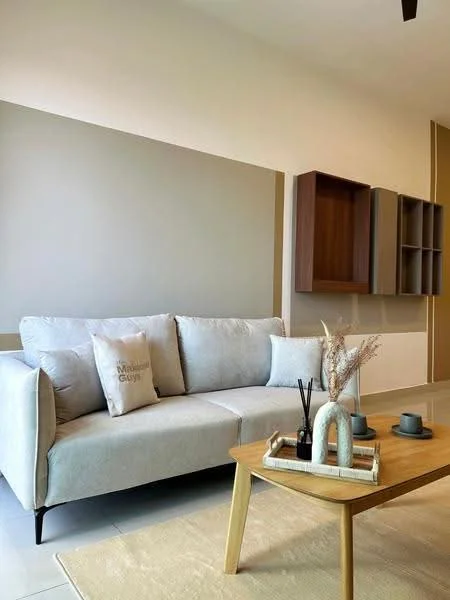 Living features: light grey fabric sofa, decorative throw pillow with text, wooden coffee table, ceramic decorative items, small black vases, light beige area rug, wall-mounted shelving unit in wood, neutral painted walls, recessed lighting, ceiling fan; style: modern.